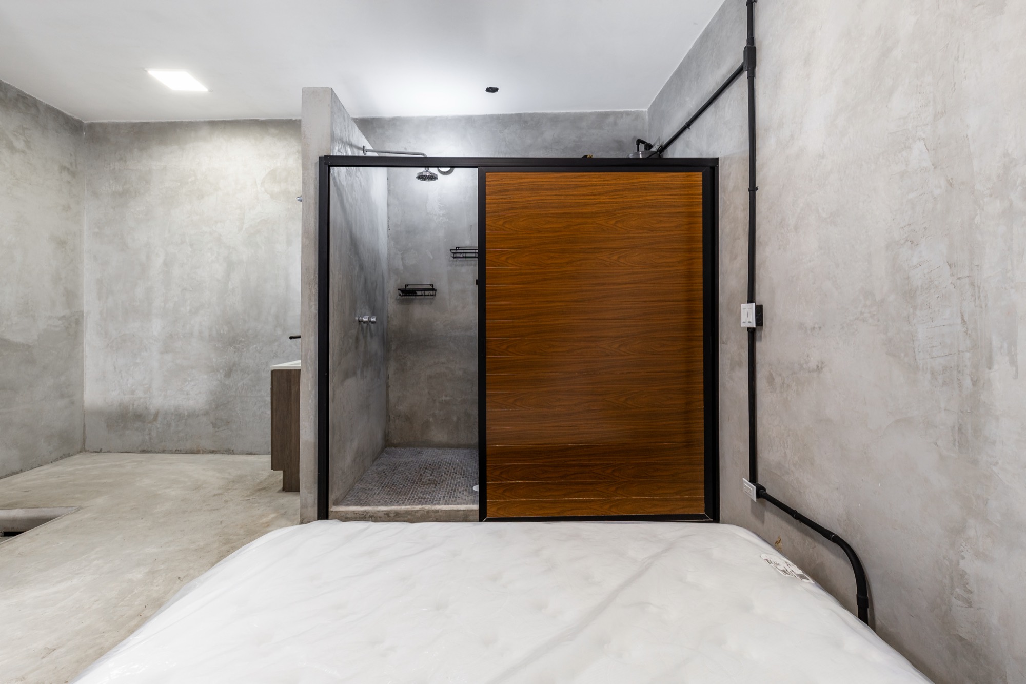 Loft bedroom with walk-in shower